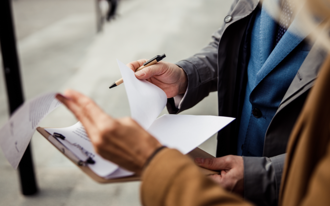 Business owner presenting a well-organized business to potential buyers